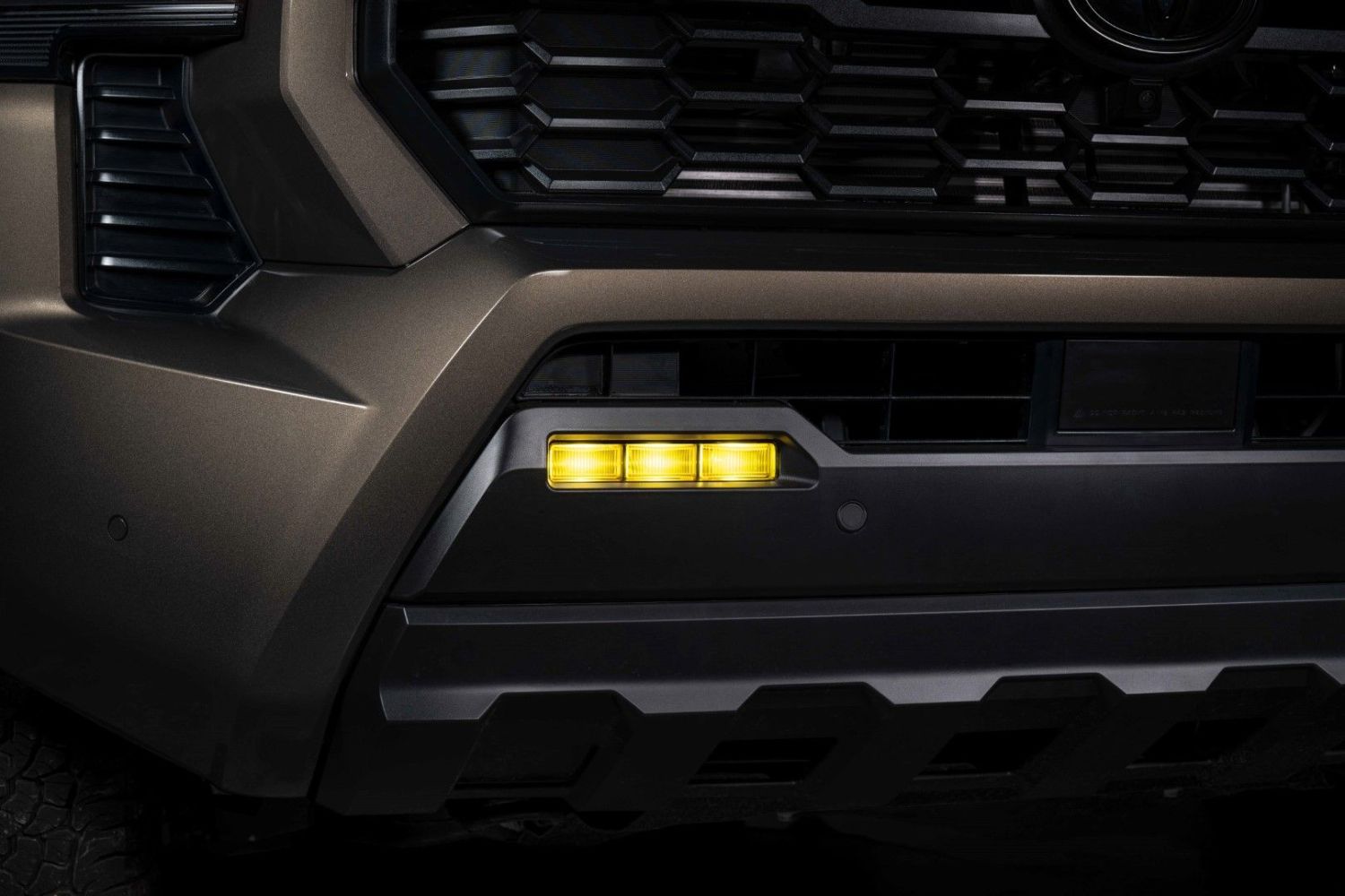2024+ Toyota Tacoma with yellow FORM LED Fog Lamps installed.