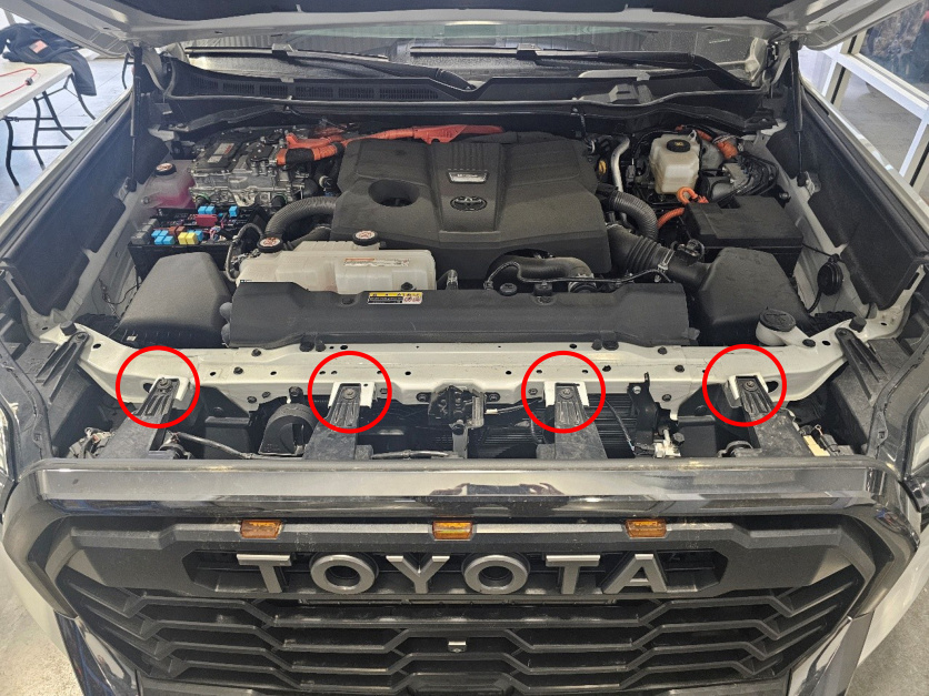 Four top front-end bolts marked on the Toyota Tundra