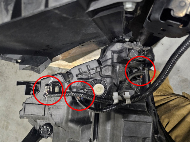 Factory headlight connectors marked on the rear of the assembly